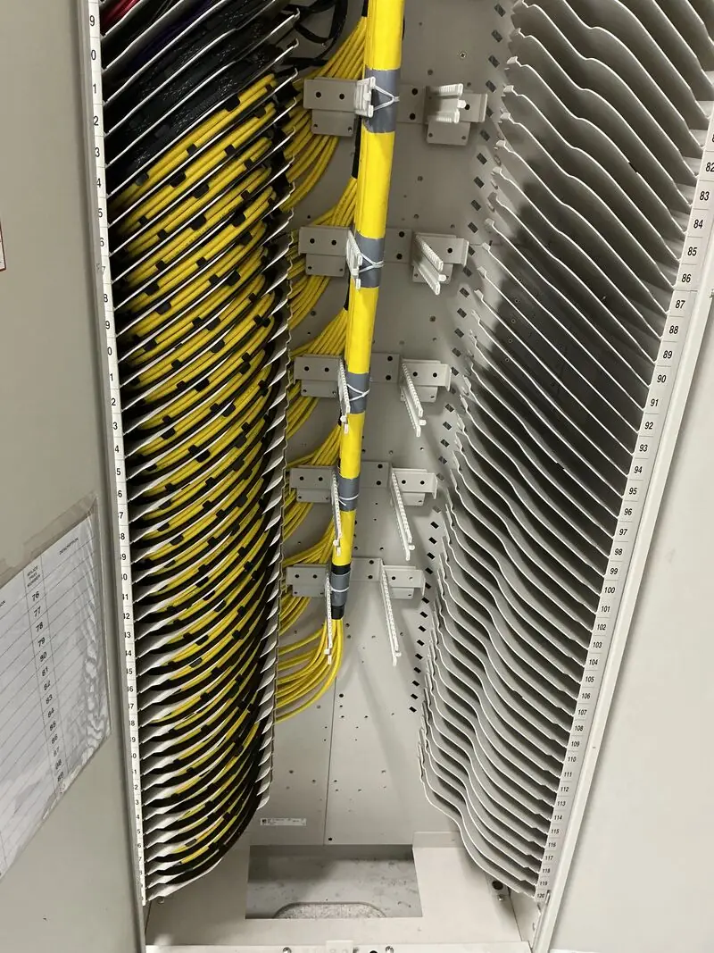 Fiber cable management and rectifier racks at an Arizona telecom facility serviced by New Phase Electrical